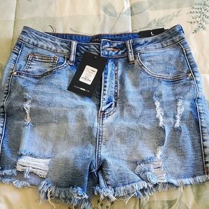Fashion Nova high rise ripped shorts size 10